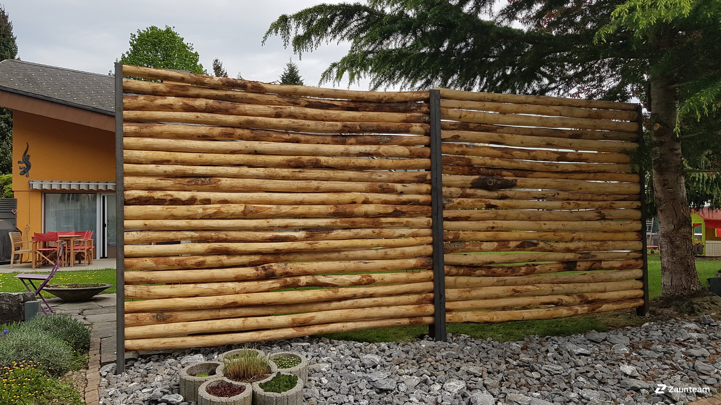 Protection brise-vue en bois de 2018 à 9450 Altstätten Suisse de Zaunteam Rheintal.